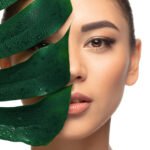 Well-kept. Portrait of beautiful young woman on white studio background. Concept of cosmetics, makeup, natural and eco treatment, skin care. Shiny and healthy look, fashion, healthcare. Copyspace.